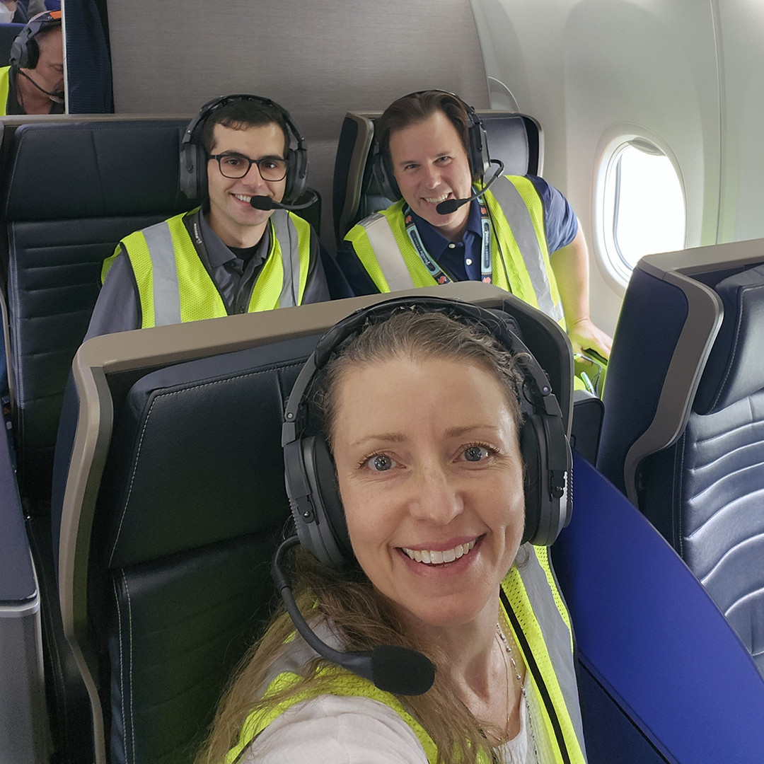  Erin Greenleaf (front) with Rami Slim and Justin Ford (left to right in back) on board the 2025 ecoDemonstrator Explorer during testing. (via Erin Greenleaf © Boeing)