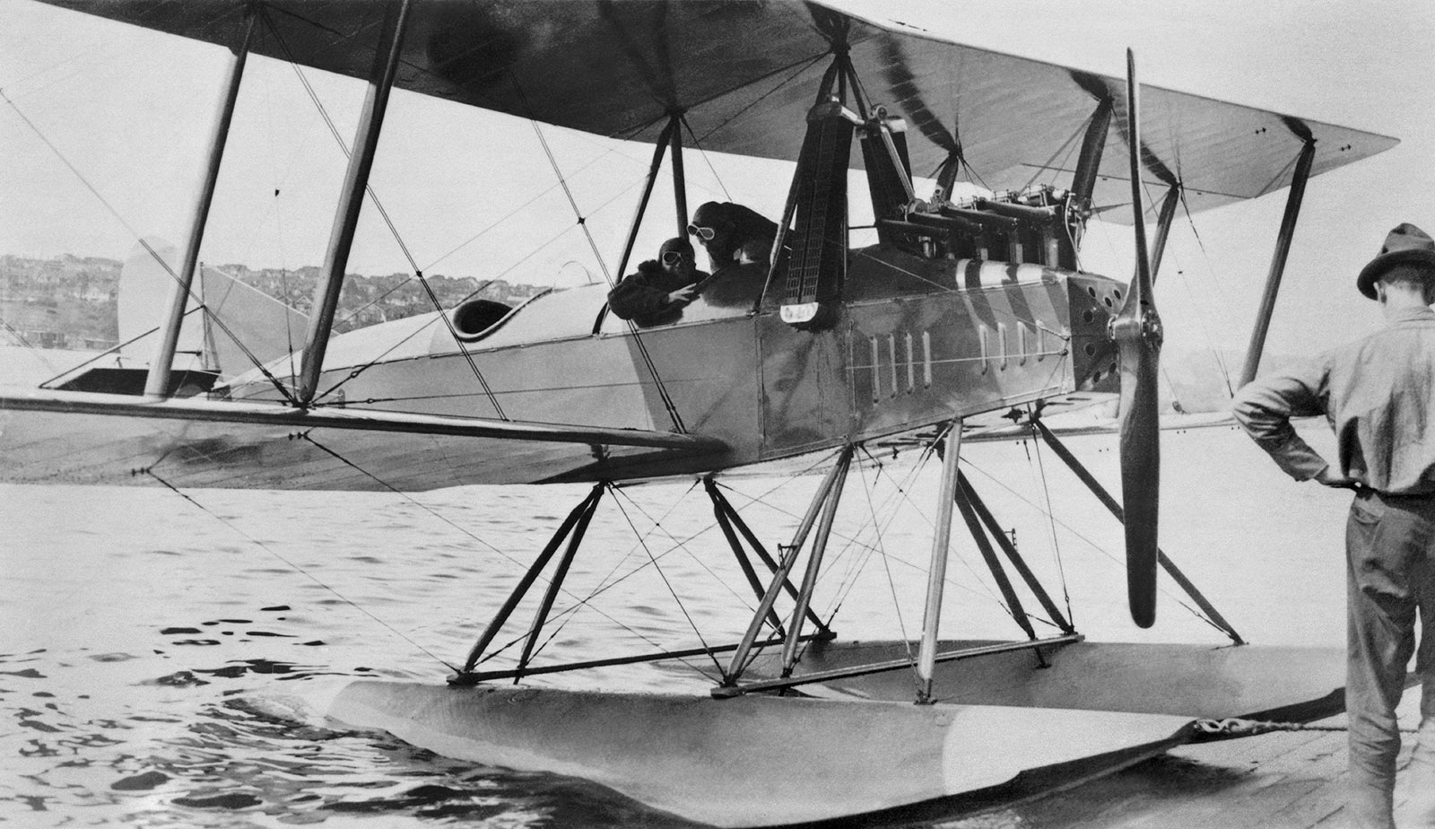 Black and white image of Model C plane docked on Lake Washington