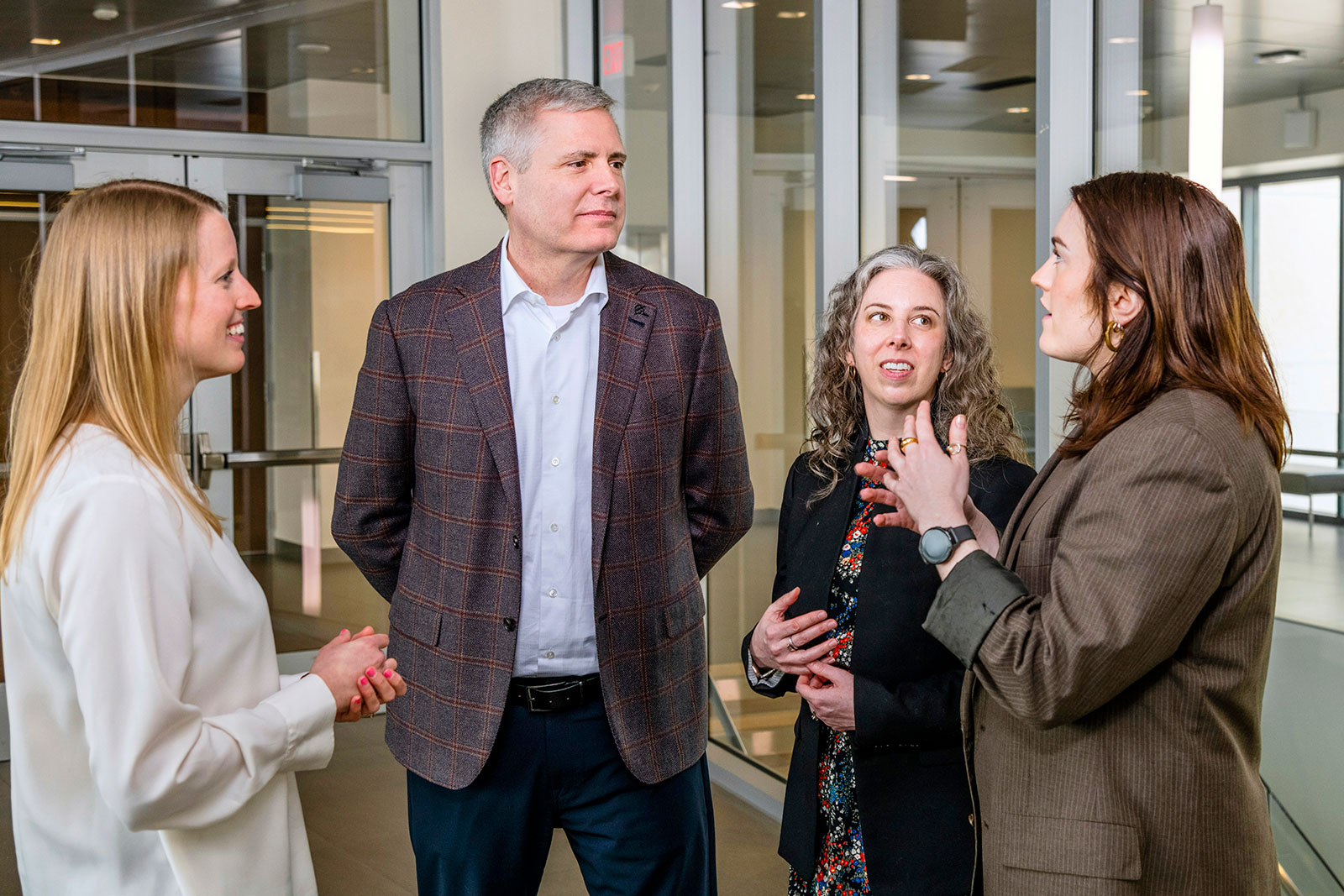 Lane Ballard Boeing CTO talks to three experts in office setting