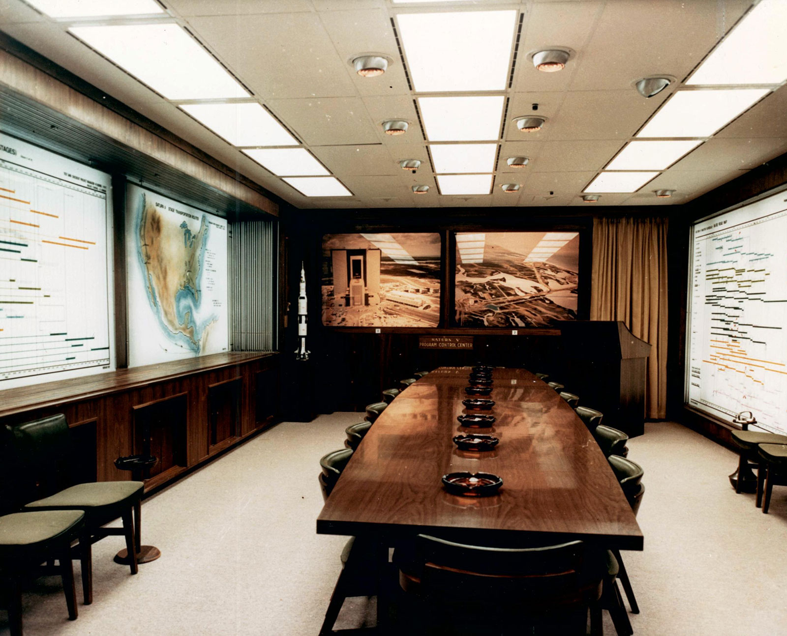 color photo of office interior - large table at center