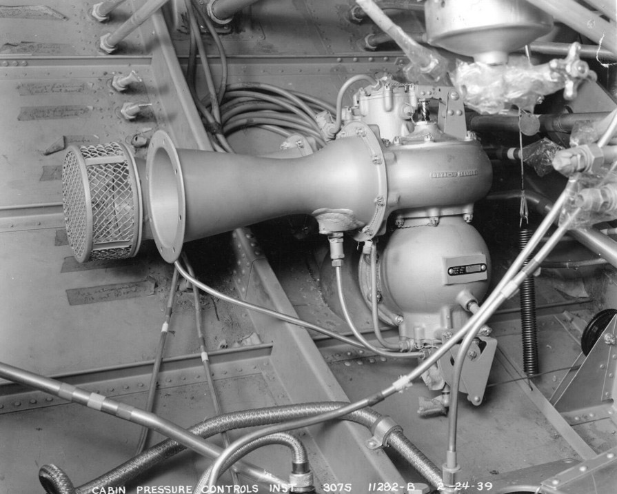 black and white photo of cabin pressure regulator