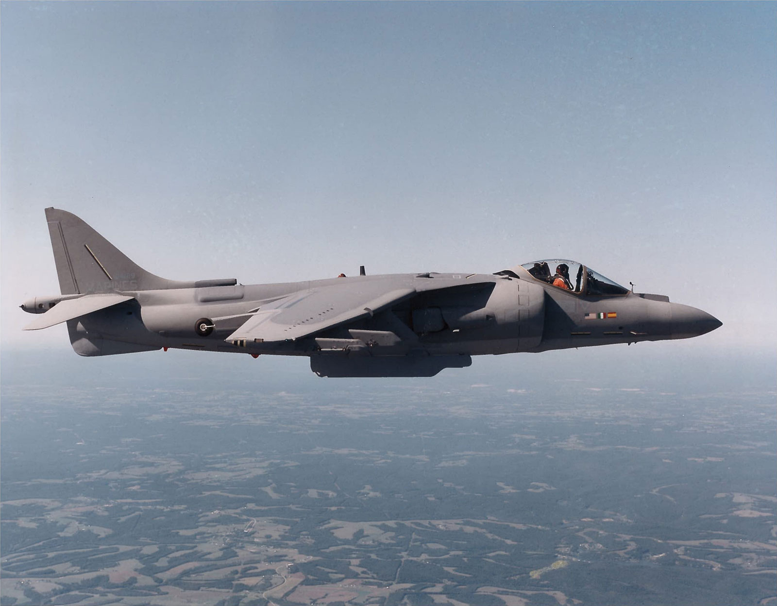 Close-up color photo of AV Harrier II Plus flying