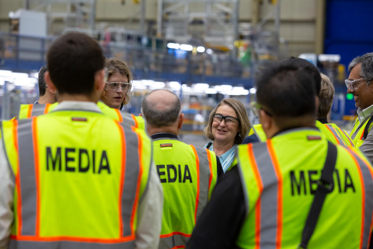 Jennifer Boland-Masterson, production leader for the Everett line, leads a media tour of the North Line in the days leading up to the grand opening. (Paul Gordon photo © Boeing) 