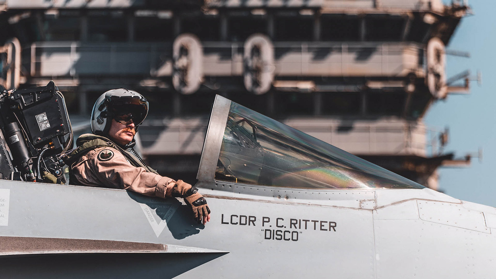 color photo of pilot in Growler aircraft