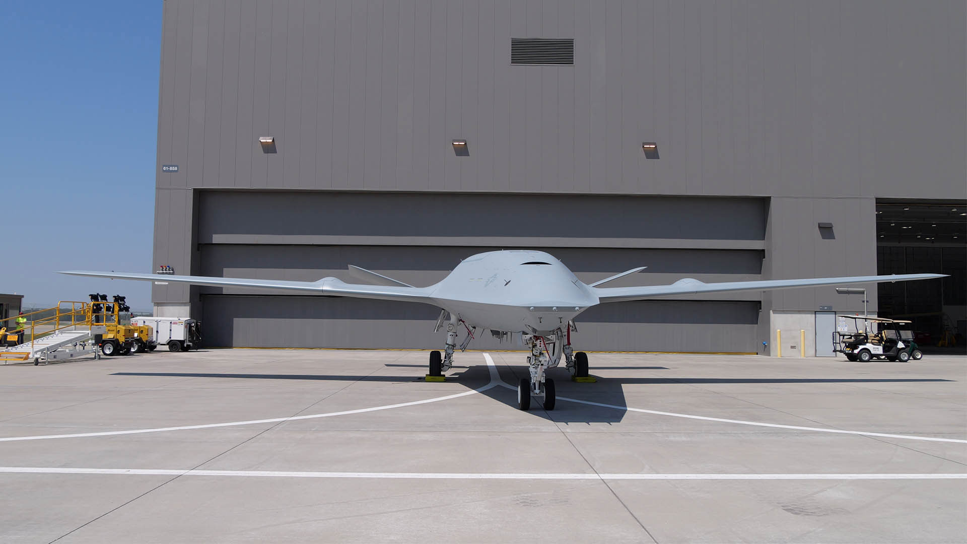An MQ-25A freshly painted in U.S. Navy livery shown on the ramp in Illinois.