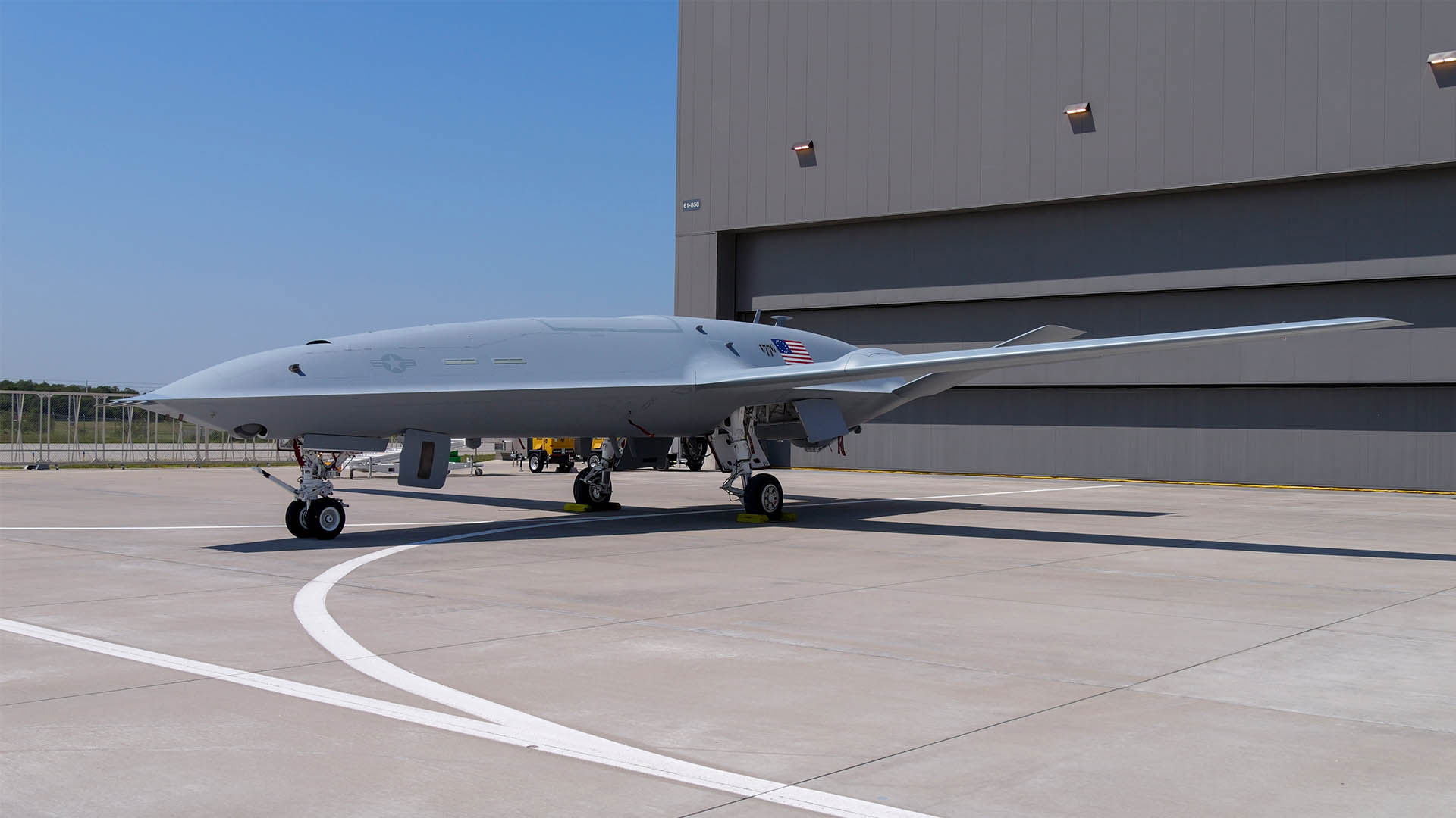 An MQ-25A freshly painted in U.S. Navy livery shown on the ramp in Illinois.