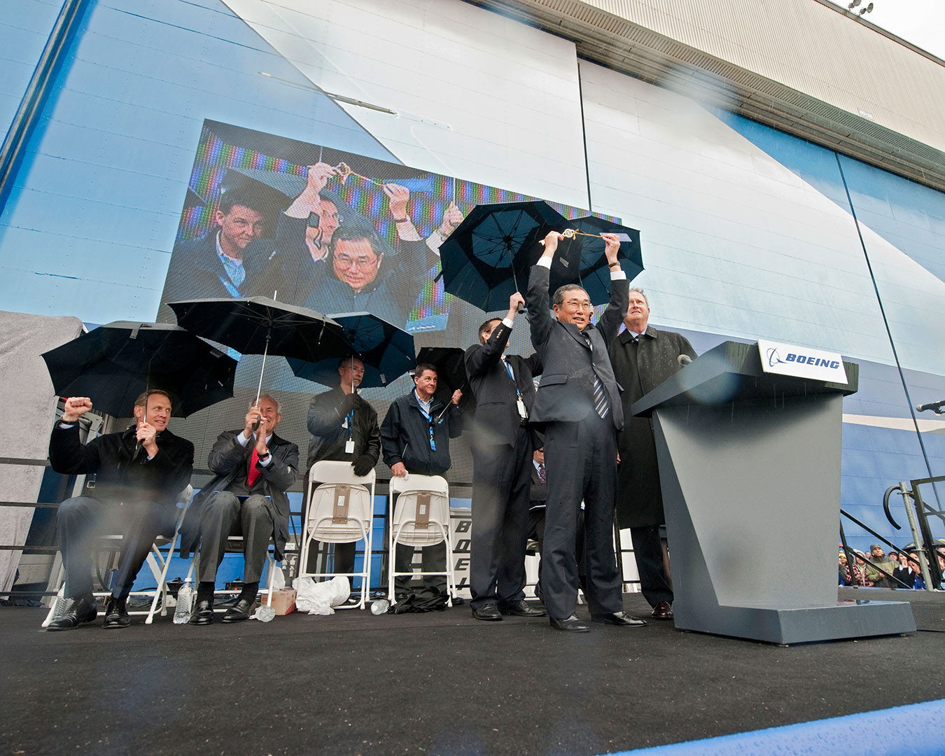ANA President and CEO Shinichiro Ito holds a ceremonial key gifted to the airline during an event to celebrate the first 787 Dreamliner delivery on Sept. 26, 2011.