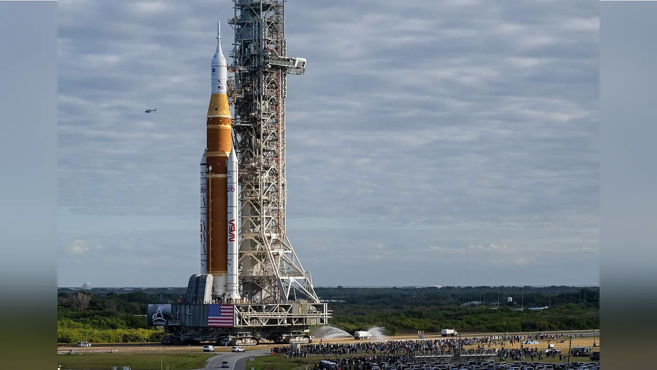 The Artemis II rocket crawls from NASA’s Vehicle Assembly Building to the launchpad.