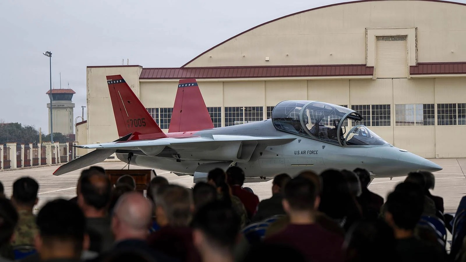 Above: A T-7A Red Hawk assigned to the 99th Flying Training Squadron, the first Air Force unit to receive the aircraft, is staged during the arrival ceremony held at Joint Base San Antonio-Randolph, Texas, Jan. 9, 2026. The arrival of the T-7A Red Hawk marks a historic milestone for the Air Force Air Education and Training Command as it replaces the six-decade-old T-38 Talon, advancing pilot training for the U.S. Air Force. (U.S. Air Force photo by Zelideth Rodriguez)