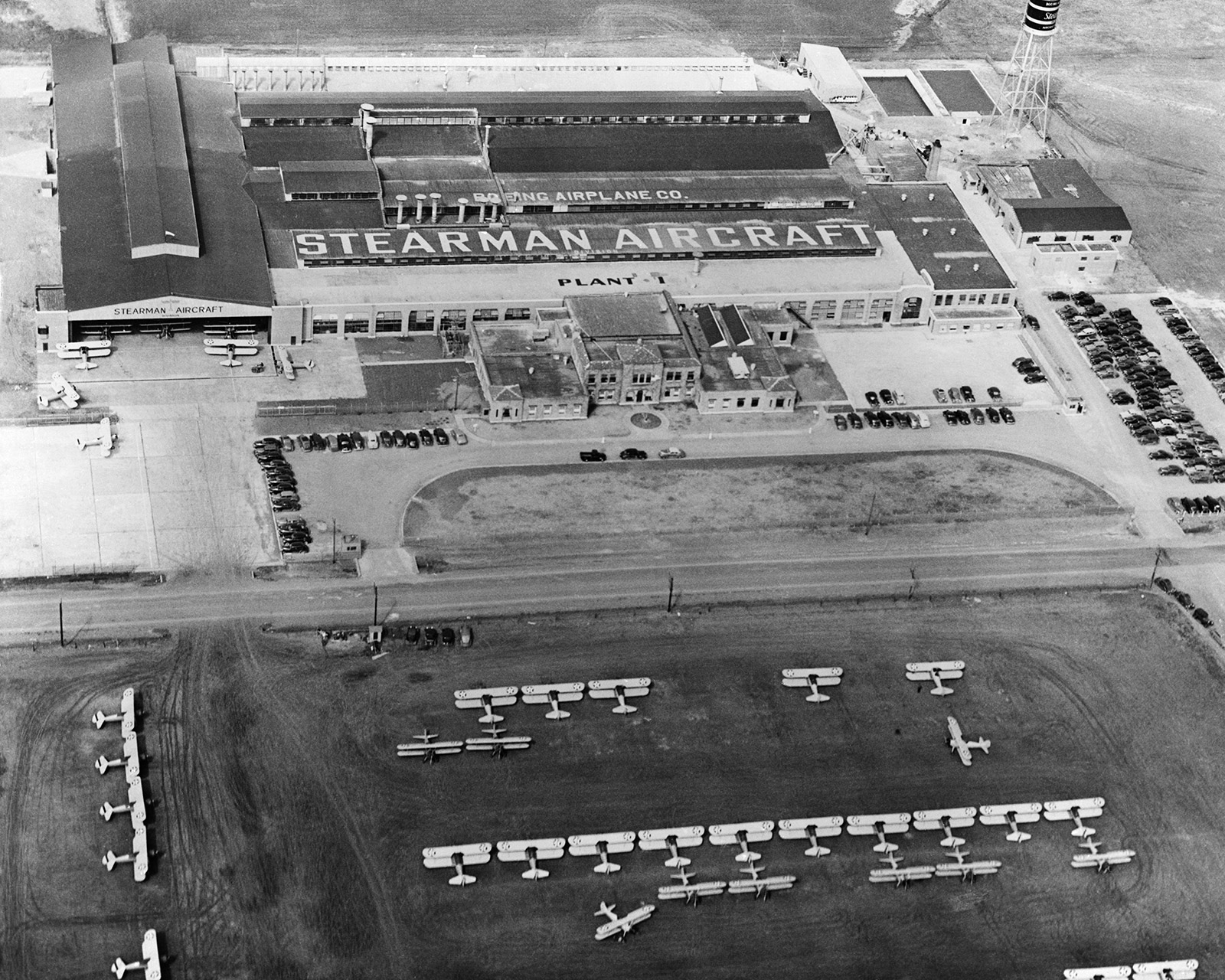 Black and white aerial view of old Stearman aircraft plant in the 1930s.