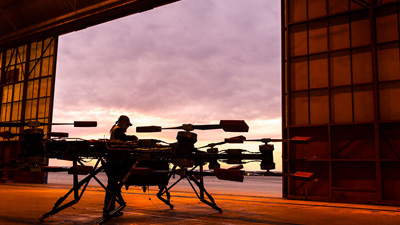 IMAGINATION MEETS INNOVATION: Boeing NeXt teammates collaborated with Disney Imagineers to craft aeroshells that fit over NeXt’s eVTOL cargo air vehicles (CAVs) to create autonomous X-wing Starfighters. 