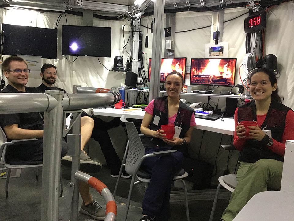 HERA participants in mock spacecraft