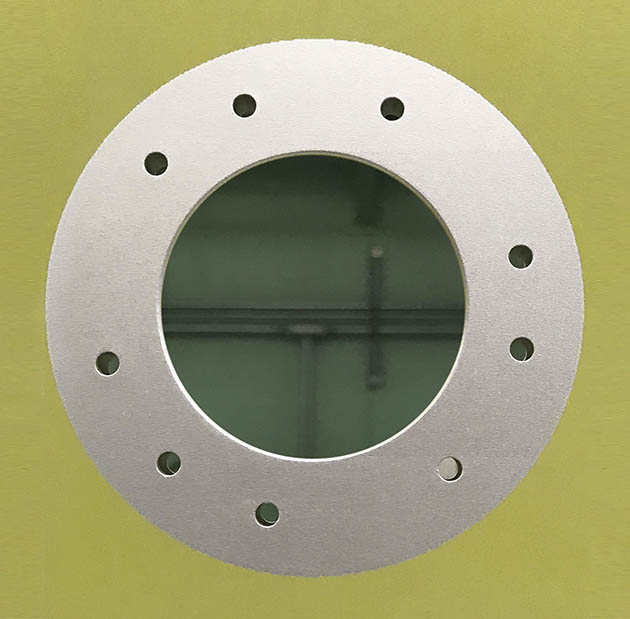 Aluminum part with paint removed by laser ablation
