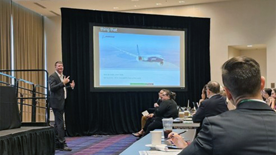 engineer addresses group of people