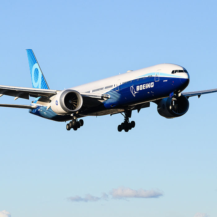 Everett, WA, USA - February 22, 2024; Boeing livery 777-9 prototype of 777X  aircraft wheels down landing as N779XX