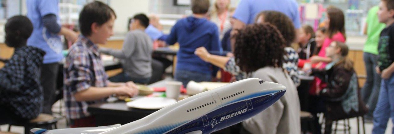Model Boeing plane in a classroom