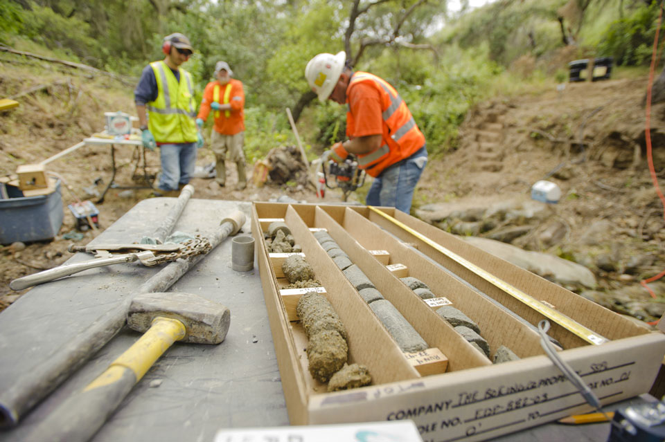 team installing groundwater monitoring wells