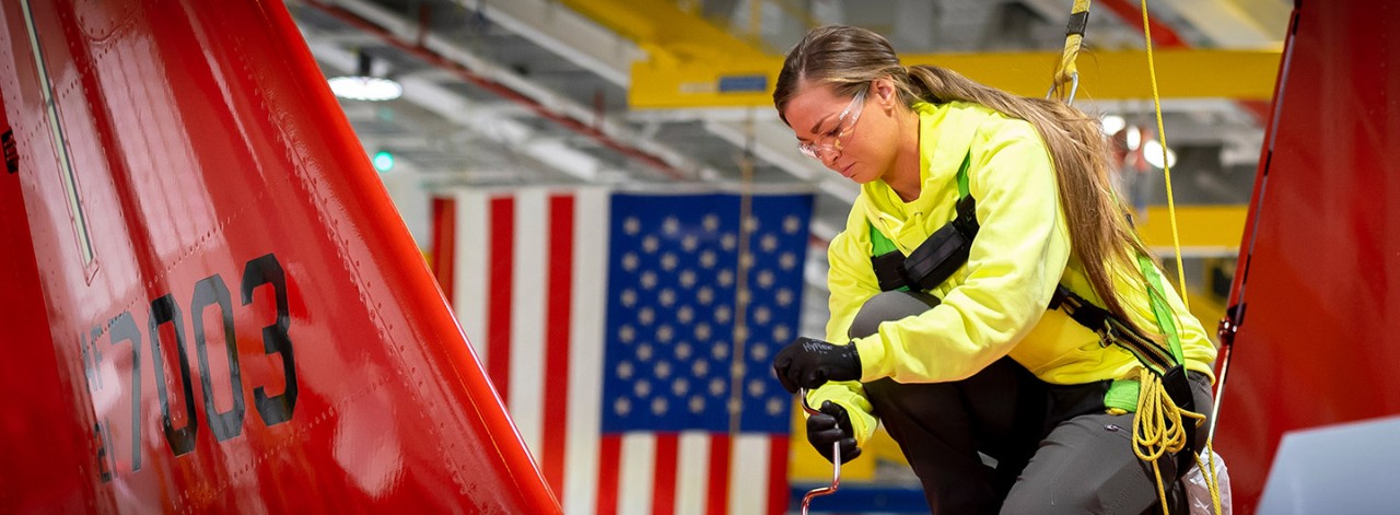 Boeing employee working on aircraft