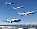 Rendering of four airplanes in flight that make up the 7 3 7 MAX family.