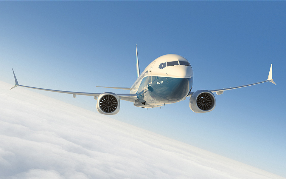 7 3 7 MAX 8 in flight front nose view.