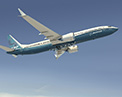 Image of the 7 3 7 MAX 8 in flight