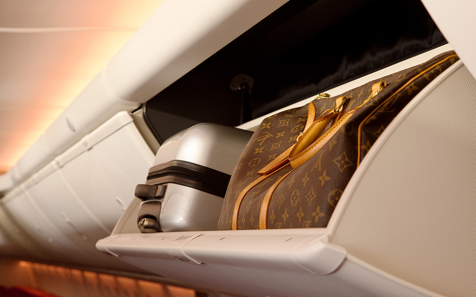 Picture of a 7 3 7 opened storage compartment.