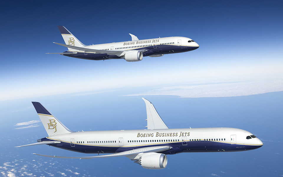 Picture of two Boeing Business Jets in flight.