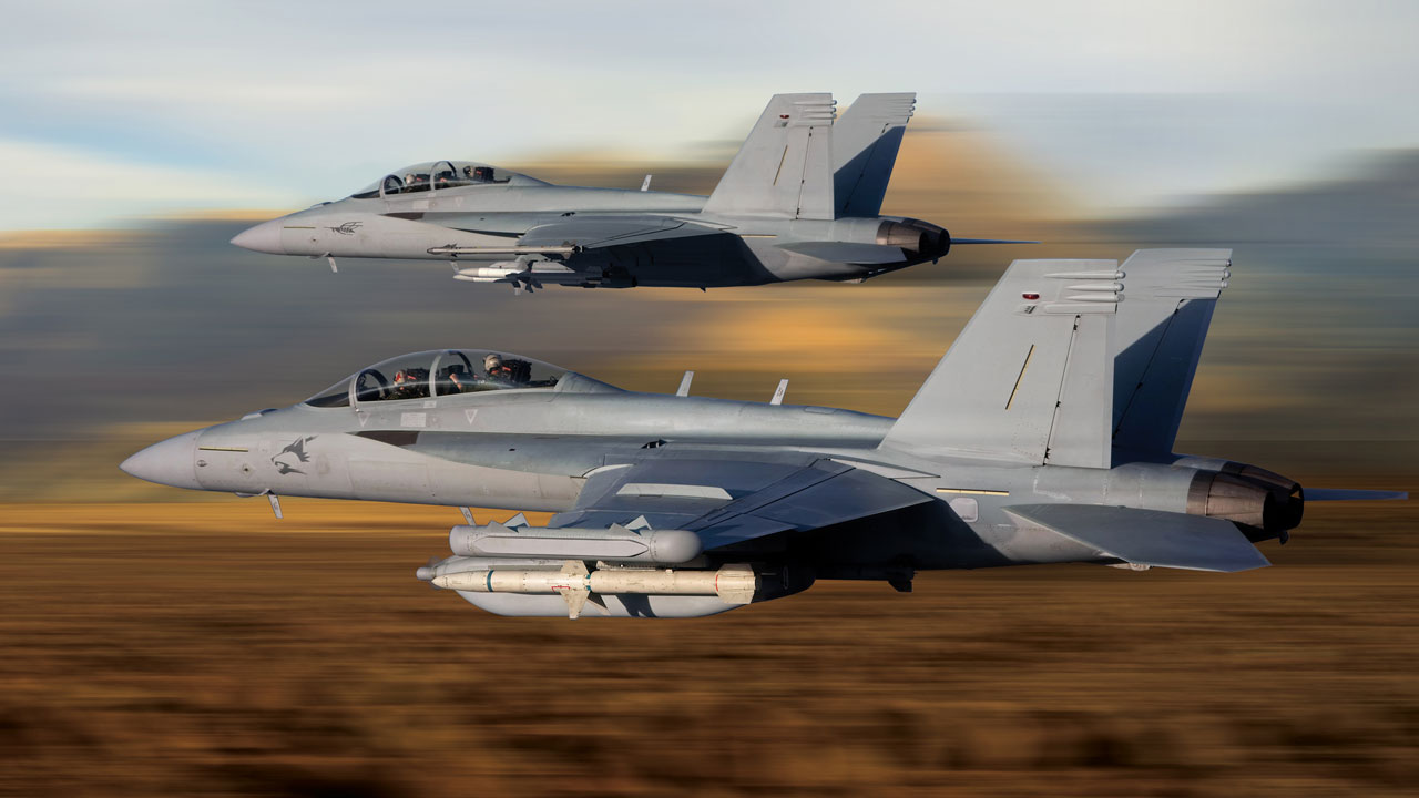 Two F A 18 aircraft in flight.