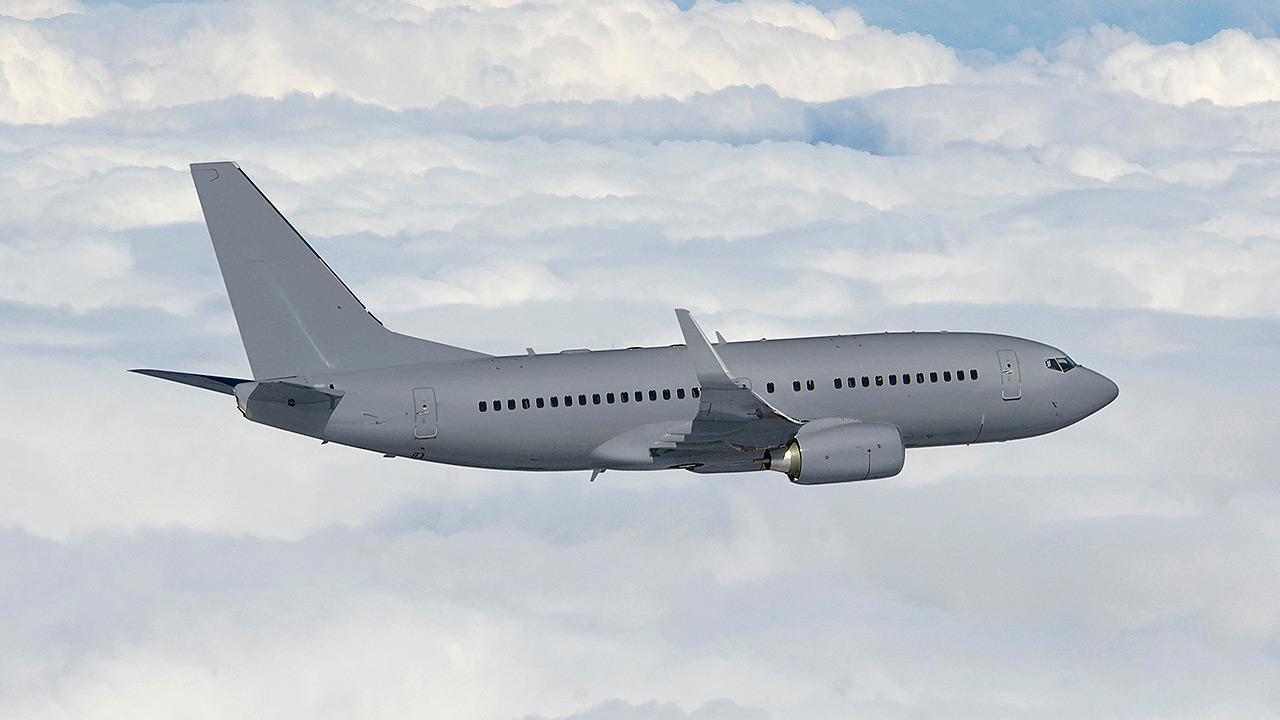 Picture of a C-40 A in flight.