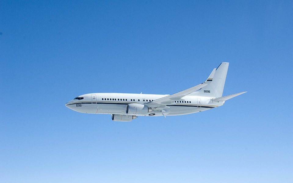 Picture of a C-40 A in flight.