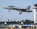 F A-18 Block III Super Hornet flying by flight tower