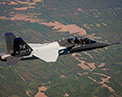 Boeing T-7A Red Hawk aircraft in flight.