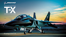 Wallpaper picture of T7A Red Hawk on flight deck at dusk.