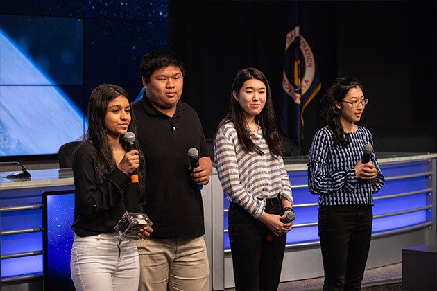 Students with Genes in Space present their experiment ahead of launch.