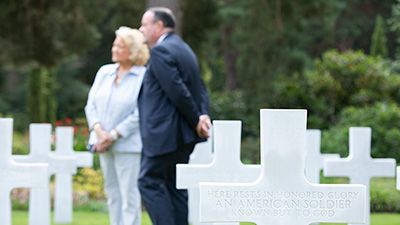 Boeing leaders Ziad Ojakli and Cheri Carter, along with leaders from the American Battle Monuments Foundation tour Brookwood American Cemetery.