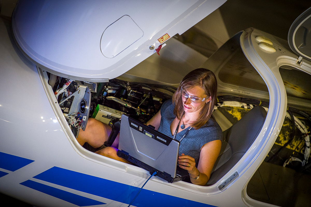 Carrie Haase in Auroras cockpit.