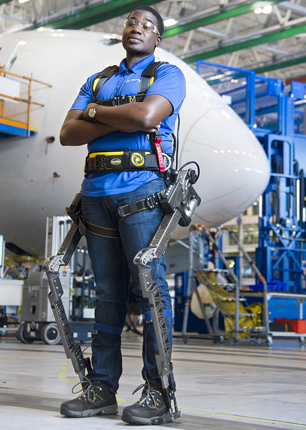 Boeing engineer Kadon Kyte evaluates an exoskeleton
