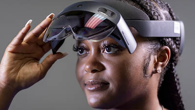 Woman holding glasses up