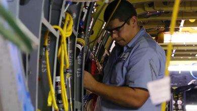 Photo of technician at work.