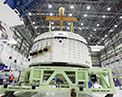 Picture of the completed Starliner service module for the Orbital Flight Test-2 mission as it prepares to be weighed.