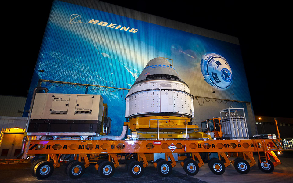 Picture of CST-100 Starliner roll out on its way to Space Launch Complex 41 Cape Canaveral for the December twentieth 2019 launch.