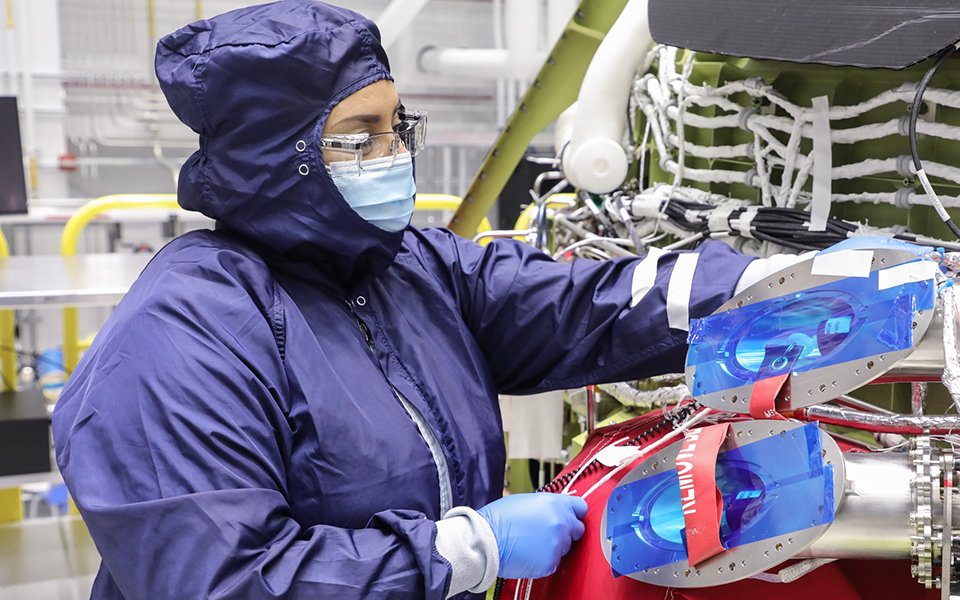 Picture of Electrical technician splicing sensor wires for CST-100 Starliner Spacecraft 2.