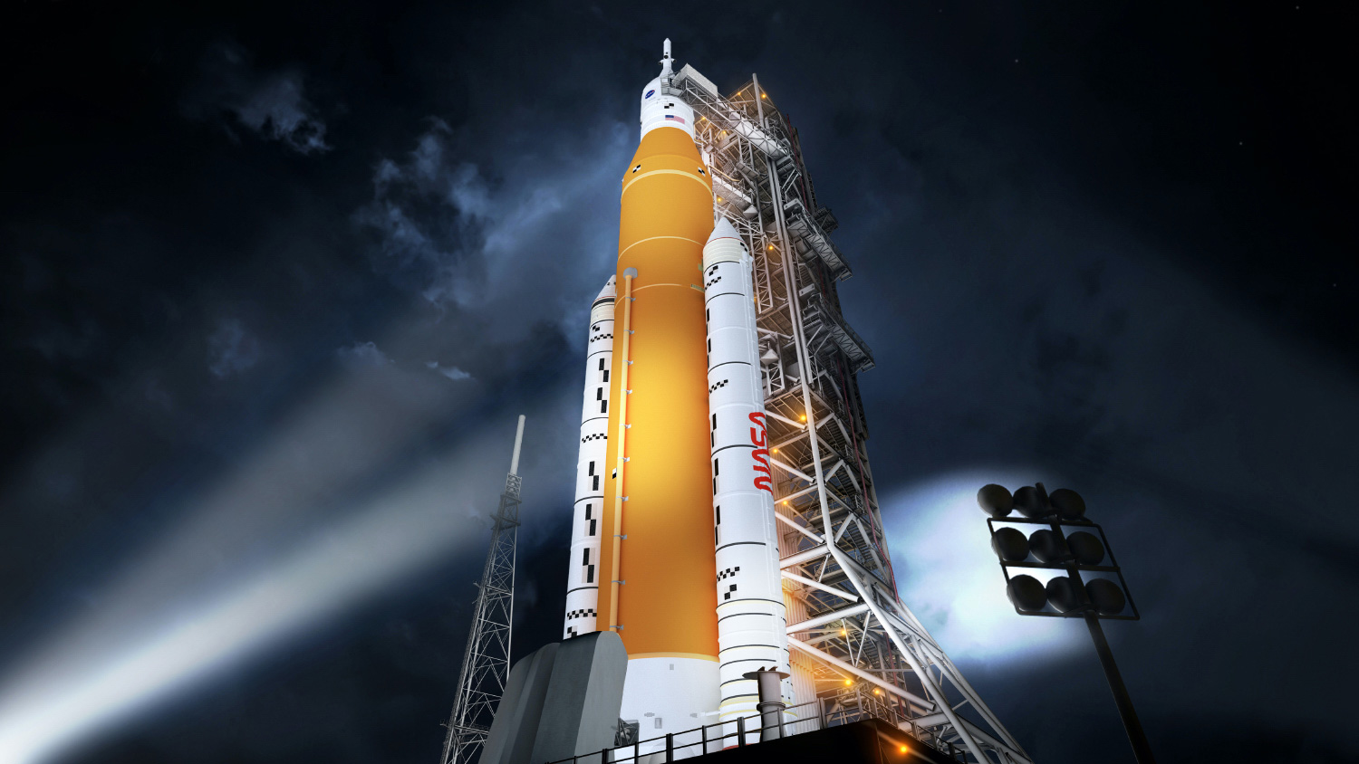 Picture of Space Launch System on launch pad.